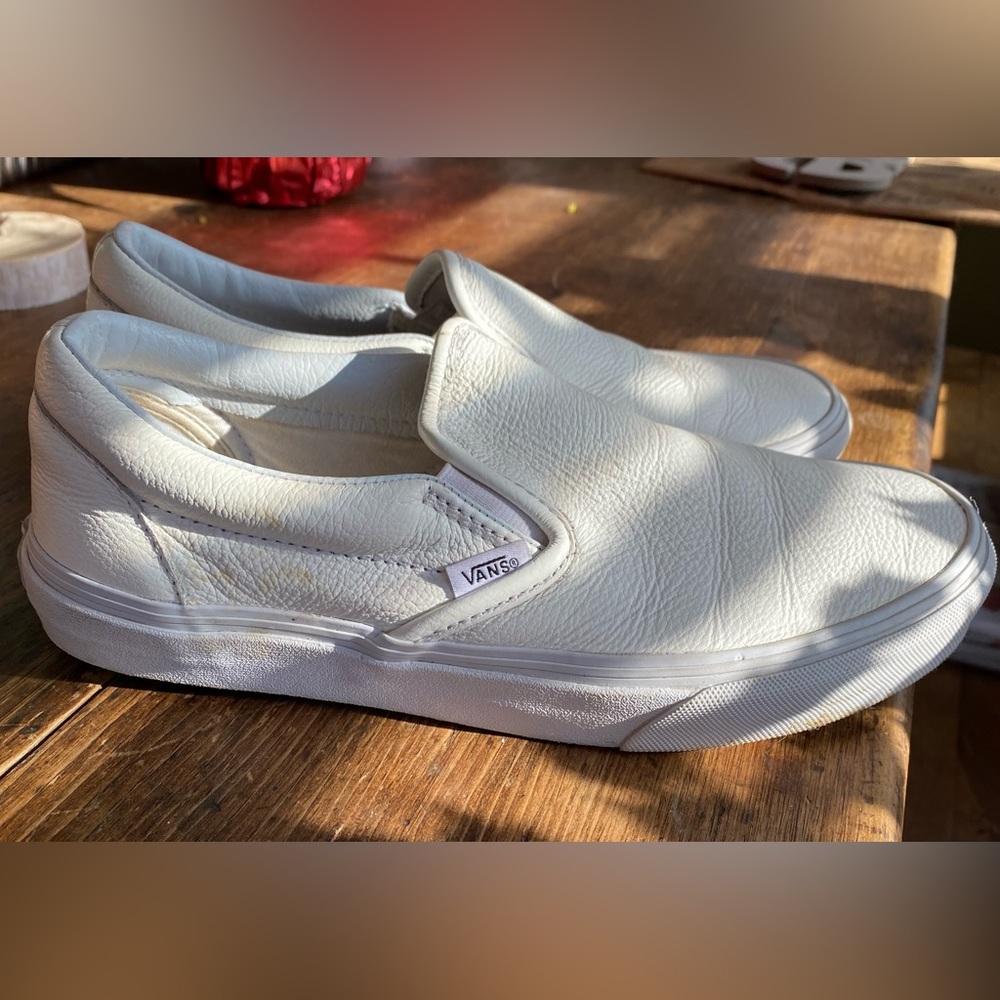 Vans white leather slip ons
